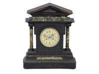 Lot 234 - A Victorian grained wooden 'marble effect' mantel clock with striking movement