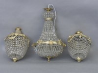 Lot 345 - A suite of three hanging bag chandeliers
