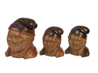 Lot 327 - Three 19th century brown stoneware head flasks