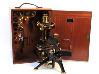 Lot 331 - A lacquered brass microscope