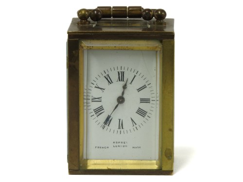 Lot 146 - A miniature brass carriage clock