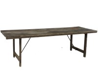 Lot 447 - An oak topped trestle table