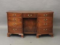 Lot 770 - A George III mahogany bow front sideboard