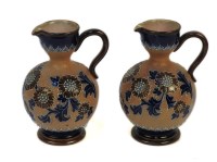 Lot 180 - A pair of Royal Doulton jugs