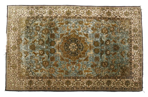 Lot 510 - A Persian silk rug