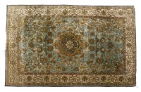 Lot 510 - A Persian silk rug