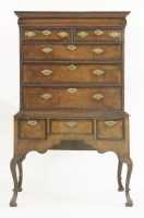 Lot 497 - An oak and mahogany chest on stand
early 18th century