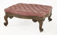 Lot 576 - A rosewood and red leather serpentine button upholstered low stool