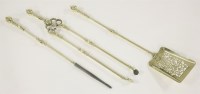 Lot 613 - A set of George III-style brass and iron fire irons