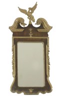 Lot 603 - A gilt and walnut wall mirror