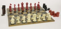 Lot 97 - A carved ivory chess set
