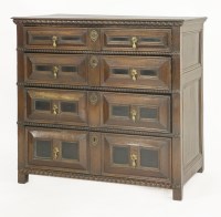 Lot 498 - A Jacobean oak fruitwood and ebony chest