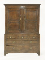 Lot 499 - An oak press cupboard