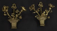 Lot 628 - A pair of gilt twin-branch wall lights