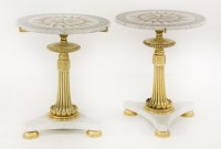 Lot 581 - A pair of circular marble-topped occasional tables