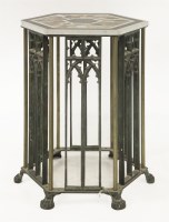 Lot 590 - A Gothic hexagonal cast iron and brass occasional table