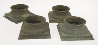 Lot 595 - Four cast bronze column bases