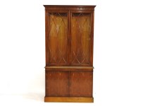 Lot 451 - A George III style yew wood display cupboard