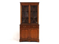 Lot 537 - A yew wood display cabinet