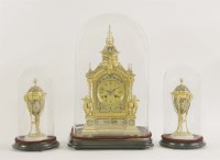 Lot 482 - A French gilt metal and champlevé clock garniture