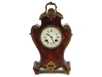 Lot 233 - A late 19th century Louis XIV design tortoiseshell and gilt metal mantel clock