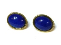 Lot 28 - A pair of gold lapis lazuli oval cabochon earrings