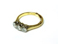 Lot 36 - An 18ct gold three stone diamond ring