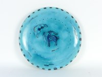 Lot 421A - A turquoise glazed pottery charger