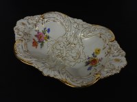 Lot 402 - A Meissen relief moulded dish with gilt highlights