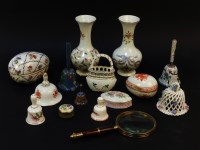 Lot 74 - A collection of miniature porcelain trinket boxes