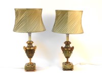 Lot 414 - A pair of early 20th century onyx and champlevé cassolette form table lamps