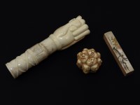 Lot 127 - An African ivory cane handle