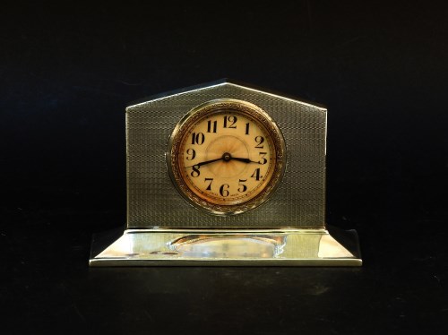 Lot 165 - A silver clock