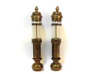 Lot 305 - A pair of GER brass railing lanterns with cylindrical glass shades and pierced detail each with copper GER labels