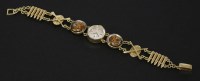 Lot 77 - A ladies American gold Movado mechanical watch