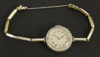 Lot 73 - A ladies platinum and gold diamond set Rolex mechanical cocktail watch