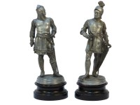 Lot 299 - A pair of pewter figures of soldiers on ebonised circular plinth bases