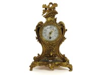 Lot 423 - An ormolu mantle clock