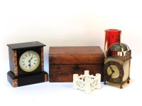Lot 244 - A Victorian black marble mantel clock