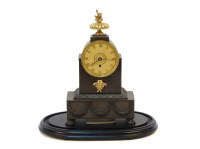 Lot 303 - A Regency bronze mantle timepiece