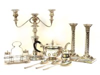 Lot 362 - A large quantity of silver plated wares to include a pair of candlesticks