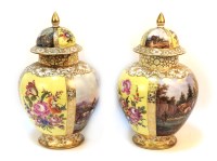 Lot 396 - A pair of Dresden porcelain vases and covers