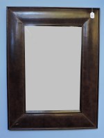 Lot 649 - A leather framed mirror