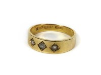 Lot 1127 - An 18ct gold diamond and seed pearl ring