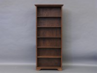 Lot 1689 - A tall oak set of bookshelves