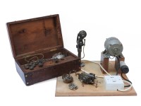 Lot 1396 - A watchmaker's lathe with chucks and accessories in a wooden box.