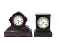 Lot 1533 - An ebonised and walnut mantel clock