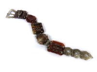 Lot 1100 - A Scottish silver and agate bracelet