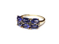 Lot 1102 - A 9ct gold two row oval cut tanzanite ring