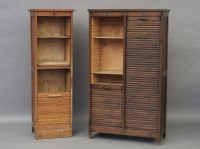 Lot 1755 - A oak double cabinet